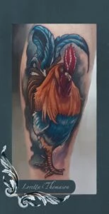 Loretta Thomason Color rooster tattoo