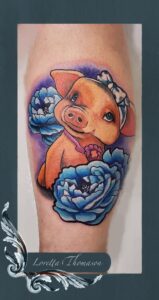 Loretta Thomason New school-pig tattoo