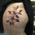 Les Hayes illustrative pair of flowers tattoo Les Hayes illustrative pair of flowers tattoo