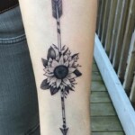 Les Hayes sunflower arrow tattoo Les Hayes sunflower arrow tattoo